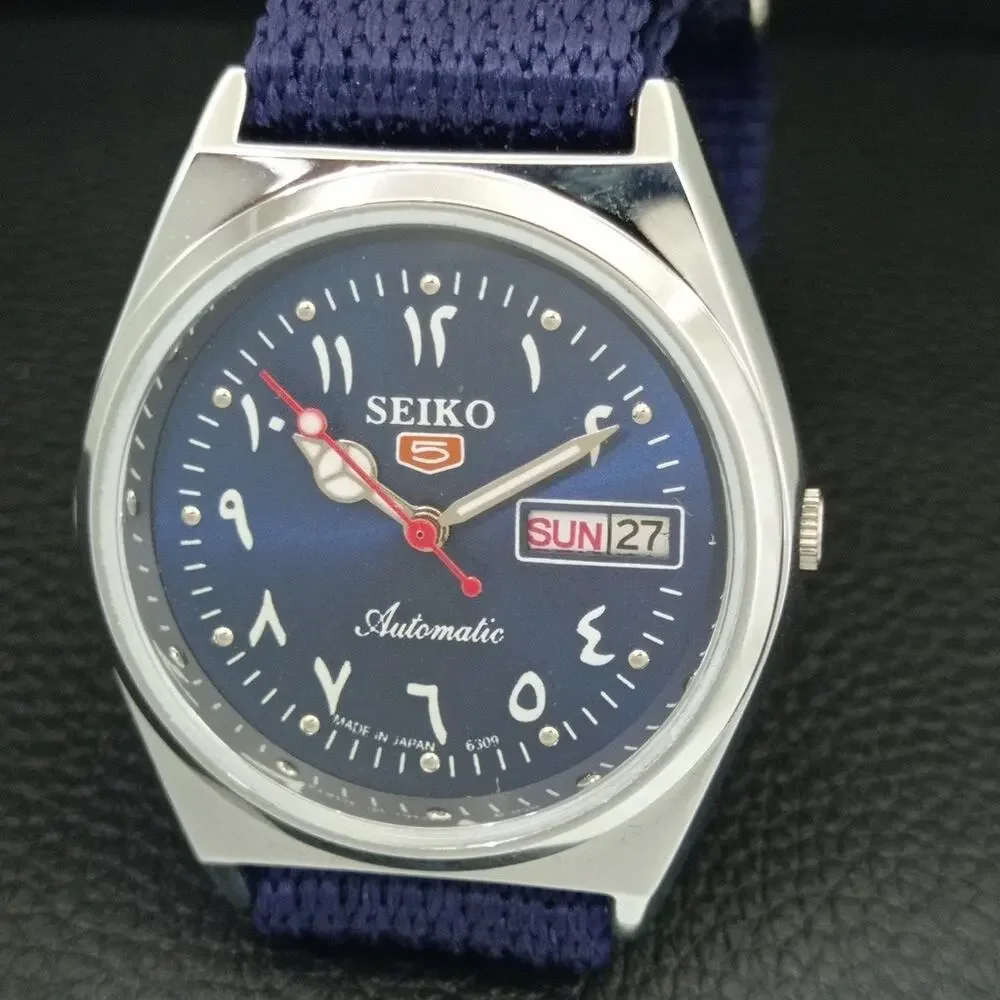 Vintage 1975 Seiko Automatic Mens Silver Watch W/daydate & Blue accents